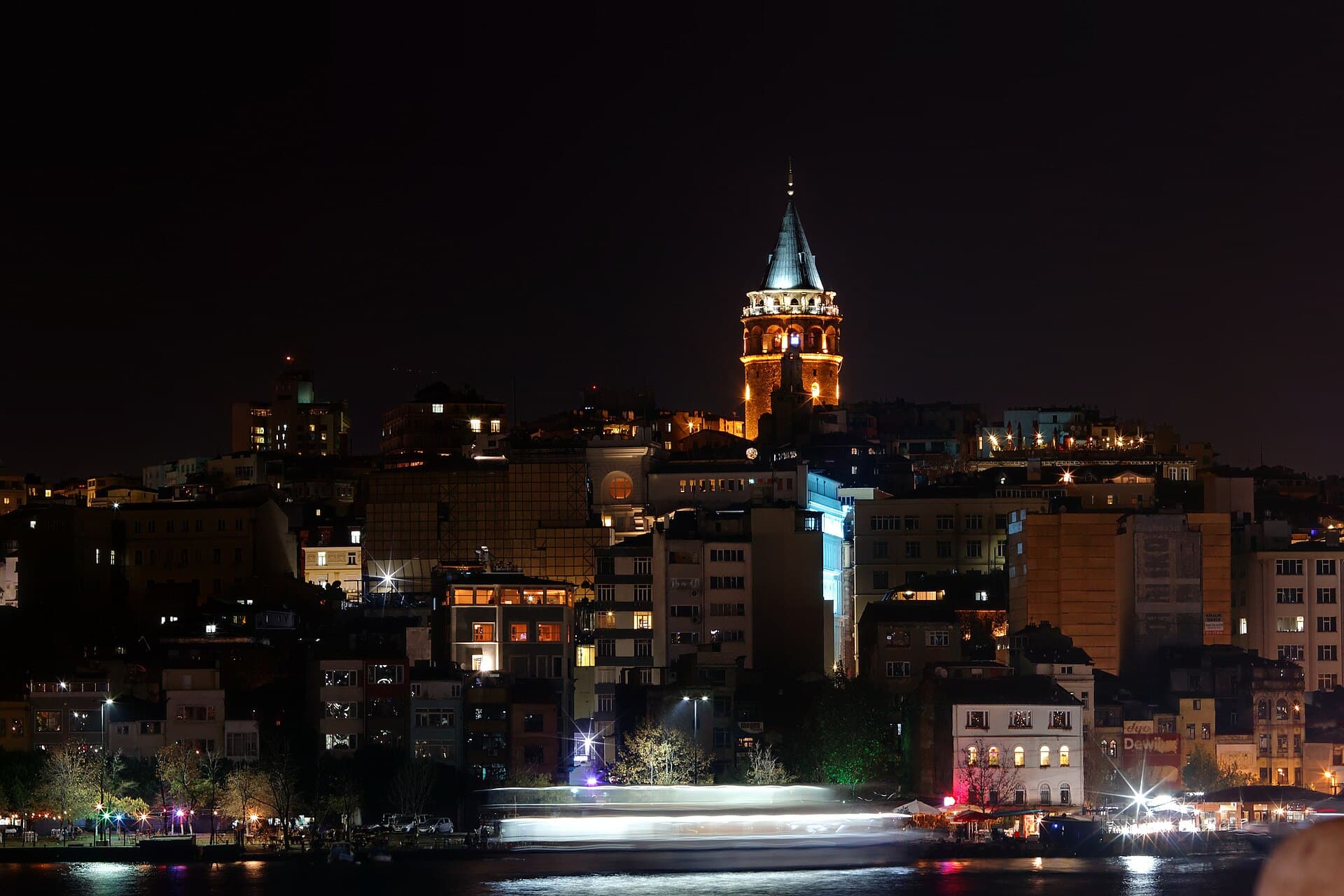 The Galata Tower lit up above the Golden Horn: the city's Genoese sentinel since the 14th century.