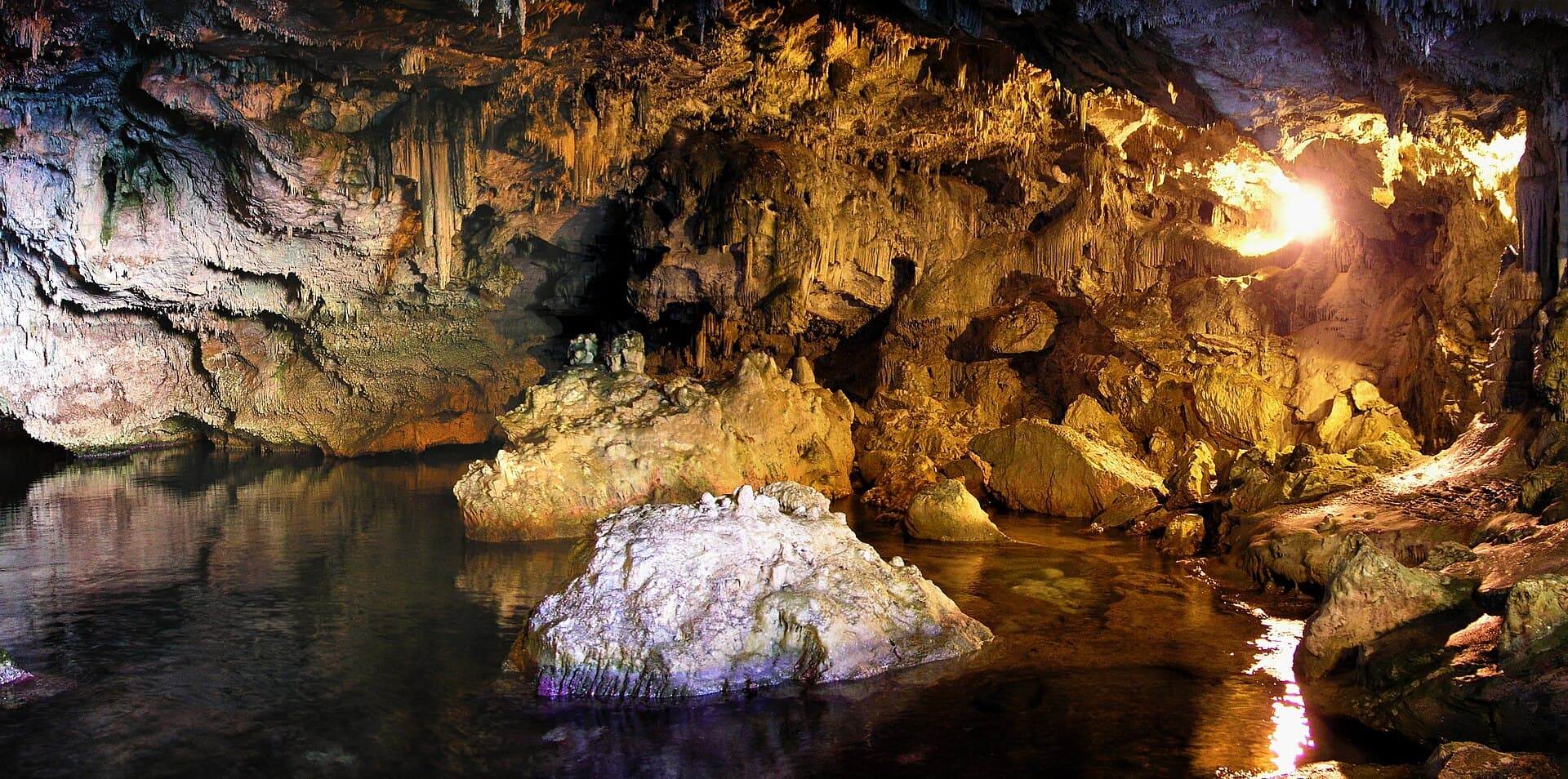 The inner lake of Neptune's Grotto: one of Italy's most celebrated sea caves, reached by boat or by the stairway.